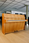 Grotrian-Steinweg 100 d’occasion en chêne clair satiné disponible chez Accord & Co
