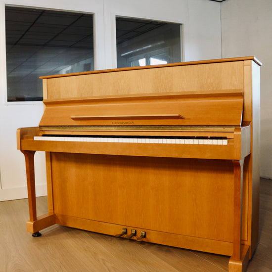 Piano acoustique Legnica 116 d'occasion en finition bois clair