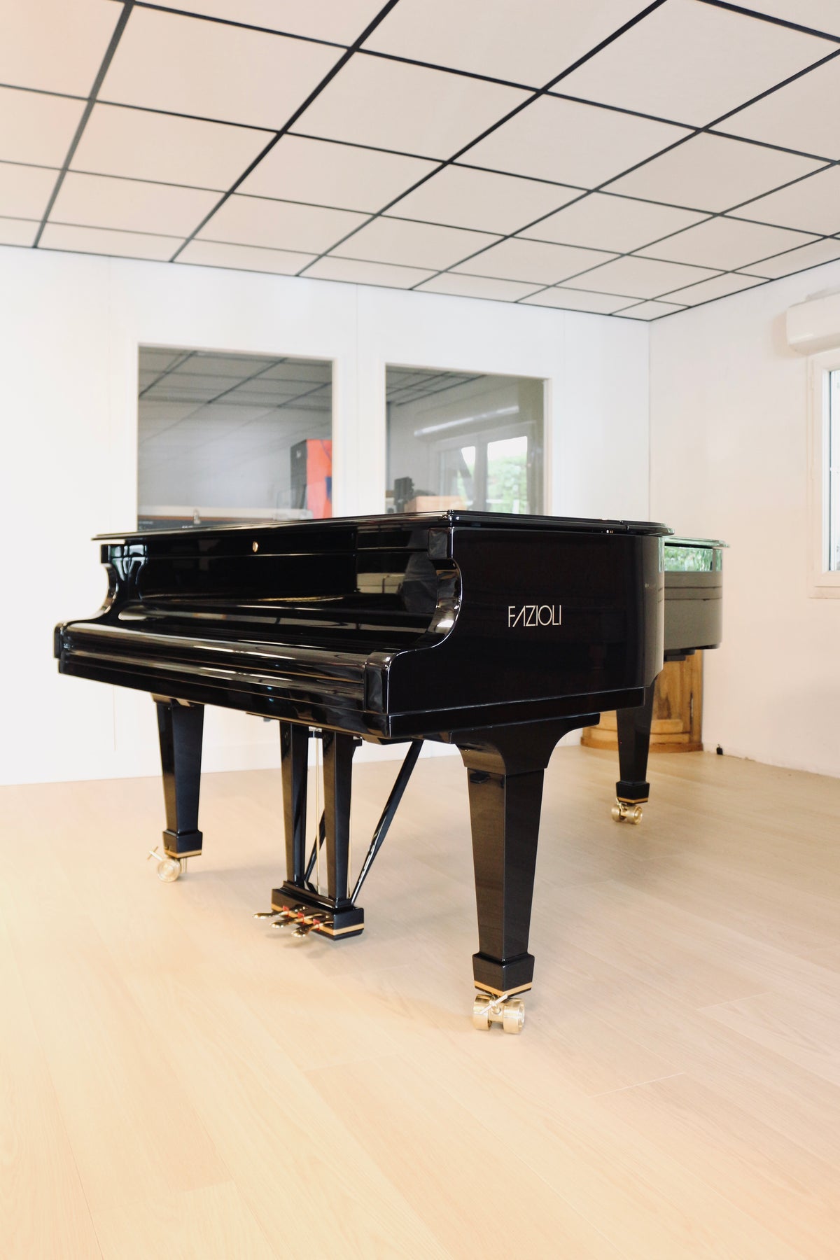 Vue de face du Fazioli F212, piano à queue d’occasion 2025 proposé par Accord & Co