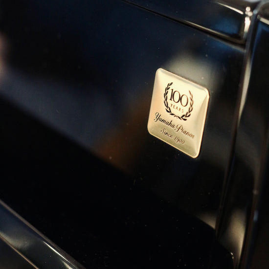 Yamaha C108 piano droit d'occasion révisé en atelier