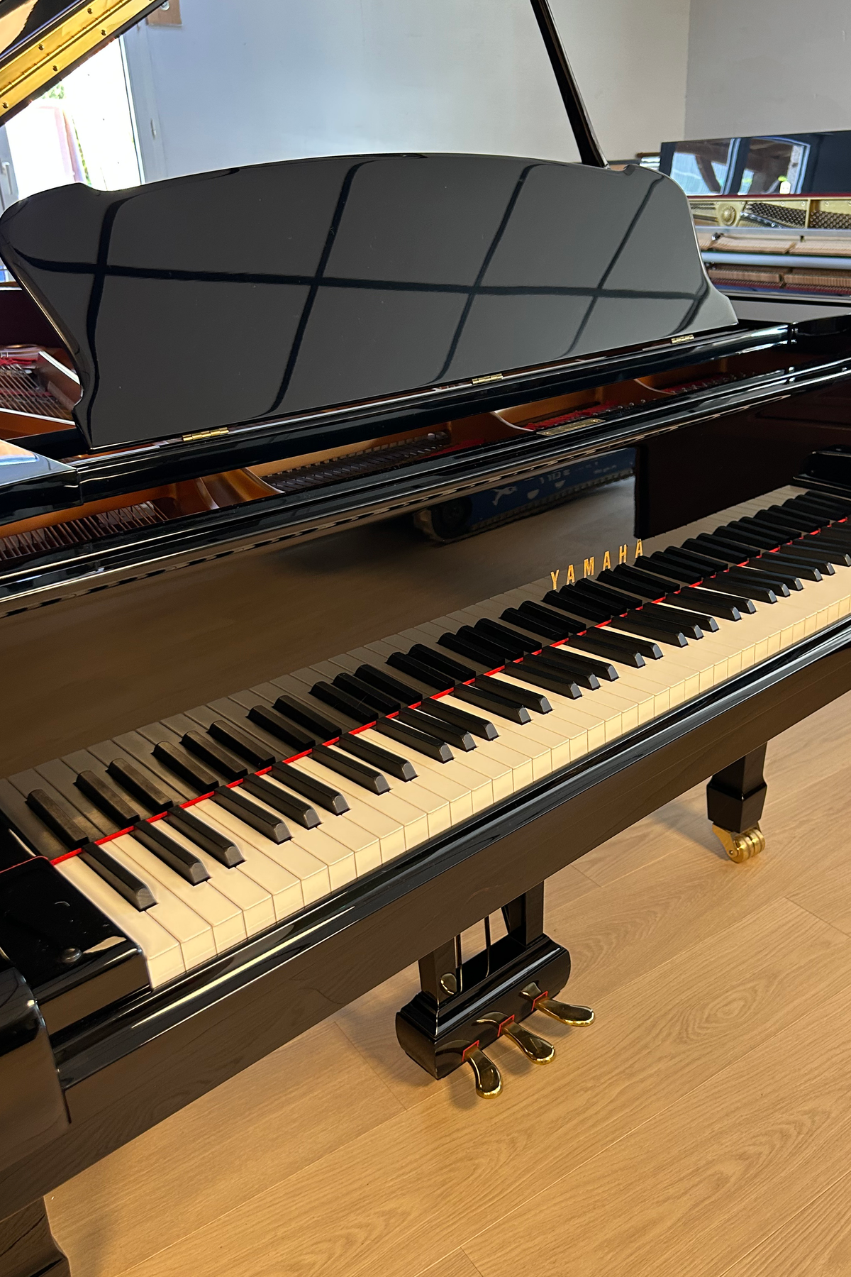 Clavier du Yamaha S6 noir brillant, piano à queue d’occasion à vendre chez Accord & Co en Rhône-Alpes