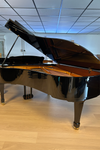 Vue arrière du Yamaha S6 noir brillant, piano à queue d’occasion à vendre chez Accord & Co en Rhône-Alpes