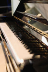 Yamaha U1 piano droit d'occasion offrant un toucher précis et une excellente stabilité d'accord